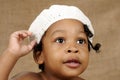 Bright eyed toddler with hat