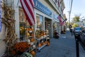 Bright fall day with main street shops and cars in Warwick village, New York, United States Royalty Free Stock Photo