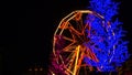 Bright Ferris Wheel With Illumination Spinning At