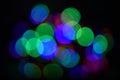 Bright and festive atmosphere of coming holiday. Christmas decorations concept. Defocused light of colorful garland Royalty Free Stock Photo