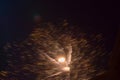 Bright festive colors and flashes of fireworks on the black sky. Blurred by creative motion blur movement Royalty Free Stock Photo