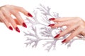 Bright festive red manicure on female hands. Nails design