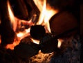 Firewood burns in fireplace of high temperature Royalty Free Stock Photo