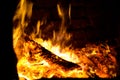 bright flame of fire burns in a fireplace Royalty Free Stock Photo