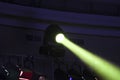 Bright floodlights attached to a steel frame. Horizontal view of multicolored floodlights attached to a frame, used inside a hall. Royalty Free Stock Photo