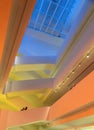 Bright Floors of modern building inside. Abstract fragment of architecture, silhouettes of people