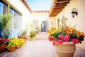 bright flowers lining a mediterraneanstyle courtyard Royalty Free Stock Photo