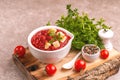 Bright fresh tasty pureed tomato soup with ingredients Royalty Free Stock Photo