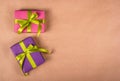 Bright gift boxes on a brown paper background. Copy space