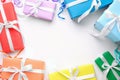 Bright gift boxes on white background. Rainbow colors