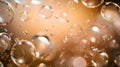 Bright golden champagne bubbles on blurred bokeh background Royalty Free Stock Photo