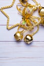 Bright golden christmas star ornament with oak leaves and jingle Royalty Free Stock Photo