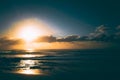 Bright golden sunset sky over a blue sea Royalty Free Stock Photo