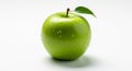 A bright green apple, possibly a Granny Smith, sits on a white surface. The apple has Royalty Free Stock Photo