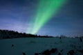 Aurora Borealis, northern lights over a hill in Norway Royalty Free Stock Photo