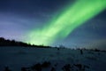 Aurora Borealis, northern lights over a hill in Norway Royalty Free Stock Photo