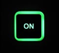 Bright green `ON` button on a sound system console Royalty Free Stock Photo