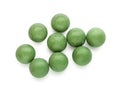Bright green chewy gumballs isolated on white Royalty Free Stock Photo