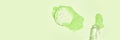 Bright green cosmetic gel with bubbles and smear on light background Royalty Free Stock Photo