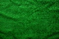 Bright green fabric texture, solid crumpled fabric background Royalty Free Stock Photo