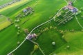 Bright green fields with farms from a bird`s eye view on a spring morning Royalty Free Stock Photo