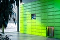 Bright Green or Lime Colored Self-Service Post Terminal Machine and One Open Locker. 3d rendering.