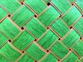 Bright green texture squares in a wicker basket background Royalty Free Stock Photo