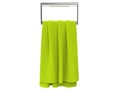 Bright green towel on a towel hanger