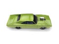 Bright green vintage American muscle car with huge engine block - top down side view