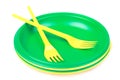 Bright green and yellow plastic disposable tableware, plates and