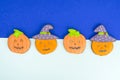 Bright Halloween pumpkin shaped gingerbread cookies.