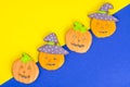 Bright Halloween pumpkin shaped gingerbread cookies.