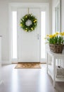 Bright Hallway with Spring Wreath and Daffodils Royalty Free Stock Photo