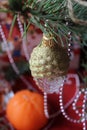 bright holiday background, red texture table with Christmas tree decorations and candles, holiday, cozy home, time of miracles