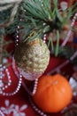 bright holiday background, red texture table with Christmas tree decorations and candles, holiday, a cozy home, time of miracles