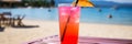 Bright ice tropical cocktail on white sandy beach with stunning sea view. Copy space Royalty Free Stock Photo