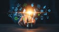 Bright idea lightbulb with digital icons representing innovation and technology Royalty Free Stock Photo
