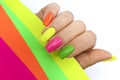 Bright illuminating multicolored fashionable manicure. Royalty Free Stock Photo