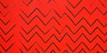 A bright, intense red background with energetic, zigzag lines that create a striking, angular
