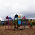 Bright and inviting outdoor play area with colorful playground equipment for children to enjoy