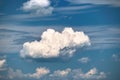 Bright landscape of white puffy cumulus clouds on blue clear sky Royalty Free Stock Photo