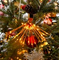 Bright lanterns on the garland glow on the tree