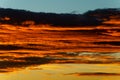 Bright orange clouds at sunset, like lava. Royalty Free Stock Photo