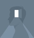 Bright light coming from an open door in the head of a human silhouette. Vector illustration Royalty Free Stock Photo