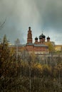 Bright light over Orthodox monastery in the dark sky Royalty Free Stock Photo