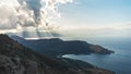 Bright light with sun rays and heavy clouds above the sea. Seascape with dramatic sky Royalty Free Stock Photo