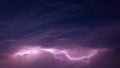 Bright Lightning On Purple Night Sky During Hunderstorm Royalty Free Stock Photo