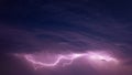 Bright Lightning On Purple Night Sky During Hunderstorm Royalty Free Stock Photo