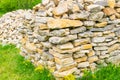 bright lime stones stacked on green grass Royalty Free Stock Photo