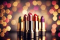 Bright lipstick of different colors shades of colored lipstick for lips. Professional makeup tool, blurred background Royalty Free Stock Photo